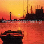 Sunset by the port : Lindos Suntours Official site : Lindos Hotel, Lindos Apartments, lindos Studios, Lindos Villas